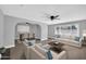 Stylish living area with modern furnishings, an open archway, and plenty of natural light at 7039 N 15Th St, Phoenix, AZ 85020