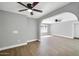 Spacious living area featuring modern flooring, archway details, and ample natural light at 7039 N 15Th St, Phoenix, AZ 85020