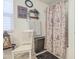 Charming bathroom with a decorated shower and vintage decor; a tranquil and inviting space at 7412 E Flower Ave, Mesa, AZ 85208