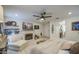 Serene main bedroom featuring a fireplace, plush seating, and access to a private en-suite bathroom at 7412 E Flower Ave, Mesa, AZ 85208