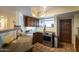 Functional kitchen with granite countertops, tile flooring, and stainless steel oven at 7755 E Thomas Rd # 17, Scottsdale, AZ 85251