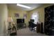 Well-lit office space featuring a desk, computer setup, and a window, perfect for productivity at 7755 E Thomas Rd # 17, Scottsdale, AZ 85251