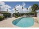 Relaxing swimming pool surrounded by lush greenery, perfect for summer days at 7755 E Thomas Rd # 17, Scottsdale, AZ 85251