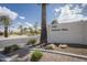 Welcoming Scottsdale Villas community sign with lush landscaping and palm trees at 7755 E Thomas Rd # 17, Scottsdale, AZ 85251