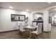 Dining room with a modern table, stylish chairs, and elegant decor at 8221 W Hess Ave, Phoenix, AZ 85043