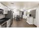 Bright kitchen with stainless steel appliances, ample counter space, and an eat-in area at 8221 W Hess Ave, Phoenix, AZ 85043