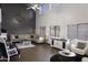 Spacious living room with high ceilings, ample natural light, and stylish furnishings at 8221 W Hess Ave, Phoenix, AZ 85043