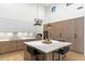 Bright open kitchen with island, and high ceilings with clerestory windows and built in oven at 8245 E Via Del Sol Dr, Scottsdale, AZ 85255