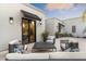Cozy outdoor patio with comfortable seating, stylish decor, and privacy walls, perfect for relaxing or entertaining guests at 8245 E Via Del Sol Dr, Scottsdale, AZ 85255