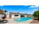 Backyard featuring a pool, a covered patio, and privacy fence at 8631 E Jackrabbit Rd, Scottsdale, AZ 85250
