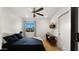 Bedroom with a ceiling fan, natural light, and a closet at 8631 E Jackrabbit Rd, Scottsdale, AZ 85250