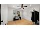 Bedroom with a ceiling fan, natural light, and a closet at 8631 E Jackrabbit Rd, Scottsdale, AZ 85250
