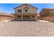 Expansive backyard featuring a covered patio, perfect for outdoor entertaining and relaxation in a private setting at 906 S 242Nd Dr, Buckeye, AZ 85326
