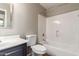 Bathroom featuring a toilet, vanity with sink, and shower over tub combination at 906 S 242Nd Dr, Buckeye, AZ 85326