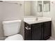 Well-maintained bathroom with vanity, toilet, and neutral finishes at 906 S 242Nd Dr, Buckeye, AZ 85326
