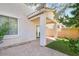 Covered patio area with desert landscaping, pavers, and stucco columns at 935 E Redondo Dr, Gilbert, AZ 85296