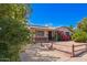 Charming single-story home with desert landscaping and lush pink bougainvillea at 1017 E Seldon Ln, Phoenix, AZ 85020