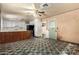 Spacious kitchen featuring tiled floors, white cabinets, and a wood kitchen island at 1017 E Seldon Ln, Phoenix, AZ 85020