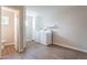 A laundry room with washer and dryer and wood flooring at 10437 E Boulder Dr, Apache Junction, AZ 85120
