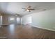 Open-concept living area with hardwood floors and ample natural light at 10437 E Boulder Dr, Apache Junction, AZ 85120