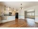 An open floor plan showcases the kitchen flowing into the dining and living areas at 10437 E Boulder Dr, Apache Junction, AZ 85120