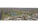 Scenic aerial view showing the community, golf course, ponds, and well-maintained streets at 11003 E Kiva Ave, Mesa, AZ 85209