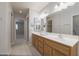 Well-lit bathroom with dual sinks, big mirrors and plenty of space at 11003 E Kiva Ave, Mesa, AZ 85209