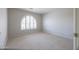 Neutral bedroom featuring a large window for plenty of natural light at 11003 E Kiva Ave, Mesa, AZ 85209