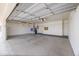 Spacious garage with ample built-in storage cabinets and great potential for customization at 11003 E Kiva Ave, Mesa, AZ 85209