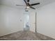 Bedroom with neutral carpet and view of bathroom at 1247 W Boxelder Cir, Chandler, AZ 85224