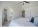 A large bedroom features an ensuite bathroom and neutral color scheme at 1247 W Boxelder Cir, Chandler, AZ 85224