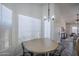 Bright dining area with natural light from the three windows at 1247 W Boxelder Cir, Chandler, AZ 85224