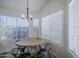 Cozy dining area with a rustic wooden table and chairs at 1247 W Boxelder Cir, Chandler, AZ 85224