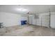 Spacious garage with automatic door opener offering plenty of room for parking and storage at 1247 W Boxelder Cir, Chandler, AZ 85224