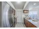 Full kitchen view with stainless steel appliances and ample cabinet space at 1247 W Boxelder Cir, Chandler, AZ 85224