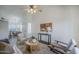 Bright living room with lots of seating and natural light at 1247 W Boxelder Cir, Chandler, AZ 85224