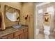 Bathroom featuring granite counters, vessel sink, modern faucet and tile shower at 13827 N Mesquite Ln, Fountain Hills, AZ 85268