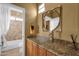 Updated bathroom with granite counters, vessel sink, modern faucet and tile shower at 13827 N Mesquite Ln, Fountain Hills, AZ 85268