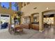 Elegant dining area with a chandelier, dining table set, and a wet bar, perfect for hosting gatherings at 13827 N Mesquite Ln, Fountain Hills, AZ 85268
