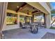 Covered patio with ceiling fan, elegant furniture, and view of the backyard at 13827 N Mesquite Ln, Fountain Hills, AZ 85268