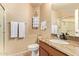 Cozy bathroom featuring a granite countertop vanity, toilet, and shower, perfect for everyday convenience at 1431 W Mountain Sky Ave, Phoenix, AZ 85045