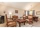 Formal living room area with an antique furniture and a wine fridge at 1431 W Mountain Sky Ave, Phoenix, AZ 85045