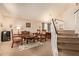 Formal living room area with an antique furniture and a staircase at 1431 W Mountain Sky Ave, Phoenix, AZ 85045