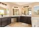 Stylish main bathroom with and sink vanities and separate shower at 1431 W Mountain Sky Ave, Phoenix, AZ 85045