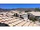 A residential neighborhood with tile roofs and mountain views at 1431 W Mountain Sky Ave, Phoenix, AZ 85045
