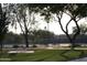 Well-maintained tennis court with lush green surroundings, inviting outdoor recreation at 1431 W Mountain Sky Ave, Phoenix, AZ 85045