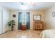Bright bedroom with tile flooring, lots of natural light, and attractive furnishings at 1438 E Mesquite St, Gilbert, AZ 85296