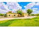 Spacious ranch home with an attached two car garage and a large front yard at 1438 E Mesquite St, Gilbert, AZ 85296