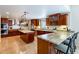 Large kitchen featuring a center island, stainless steel appliances, and granite countertops at 1438 E Mesquite St, Gilbert, AZ 85296