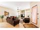 Inviting living room with neutral colors and ample natural light at 1438 E Mesquite St, Gilbert, AZ 85296